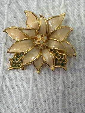 Nolan Miller Gold-Tone Cream Enamel Flower Brooch with Green Accents